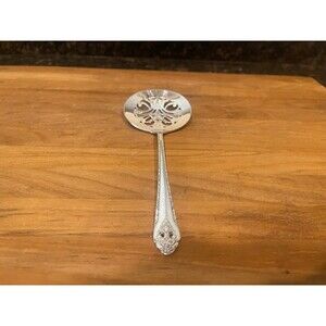 Holmes and Edward’s silver plated lovely lady tomato server
